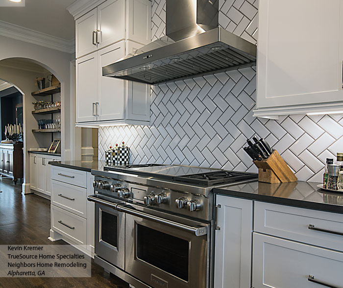 White Shaker Cabinets with a Large Kitchen Island